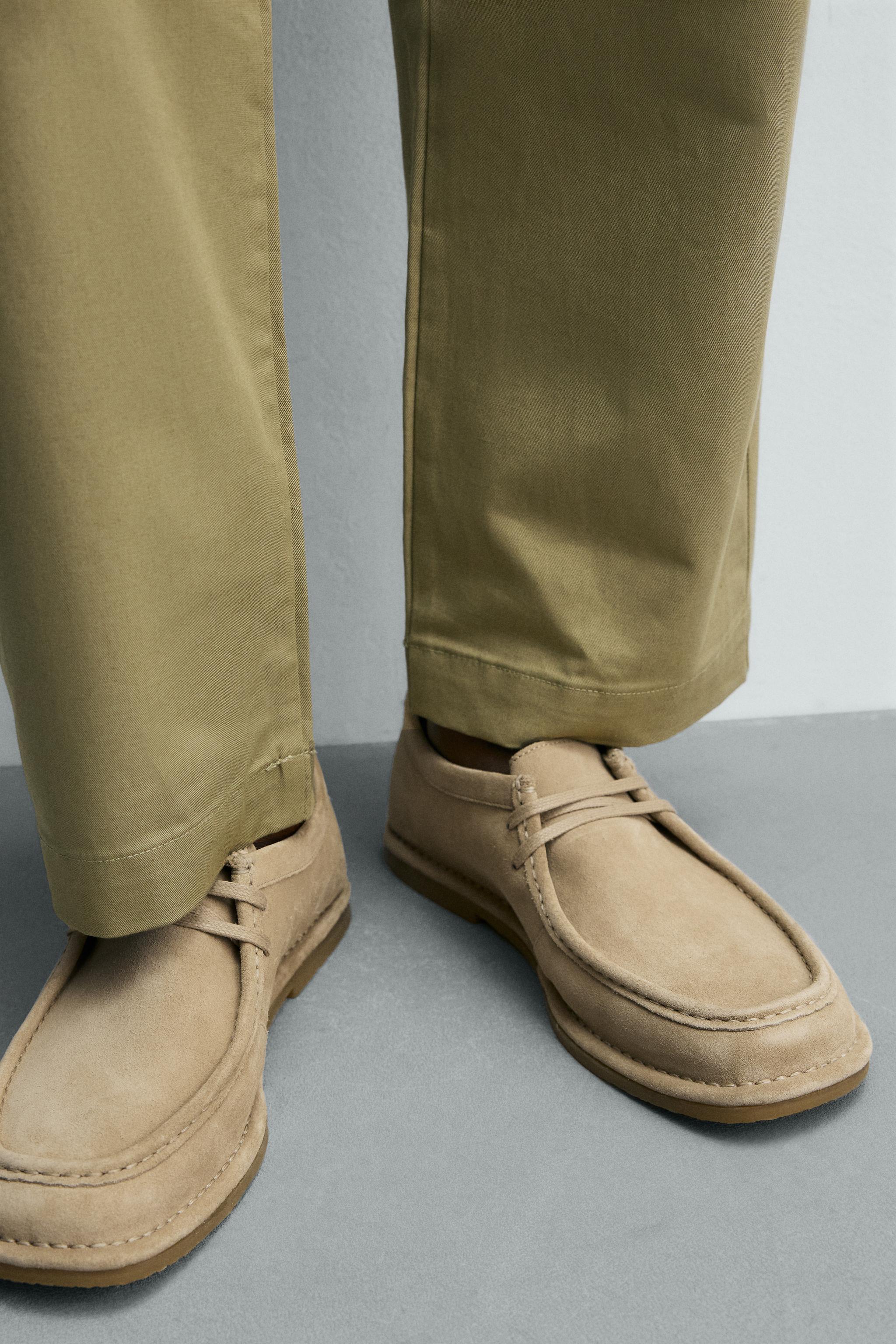CHAUSSURES EN CUIR AVEC BORD LARGE